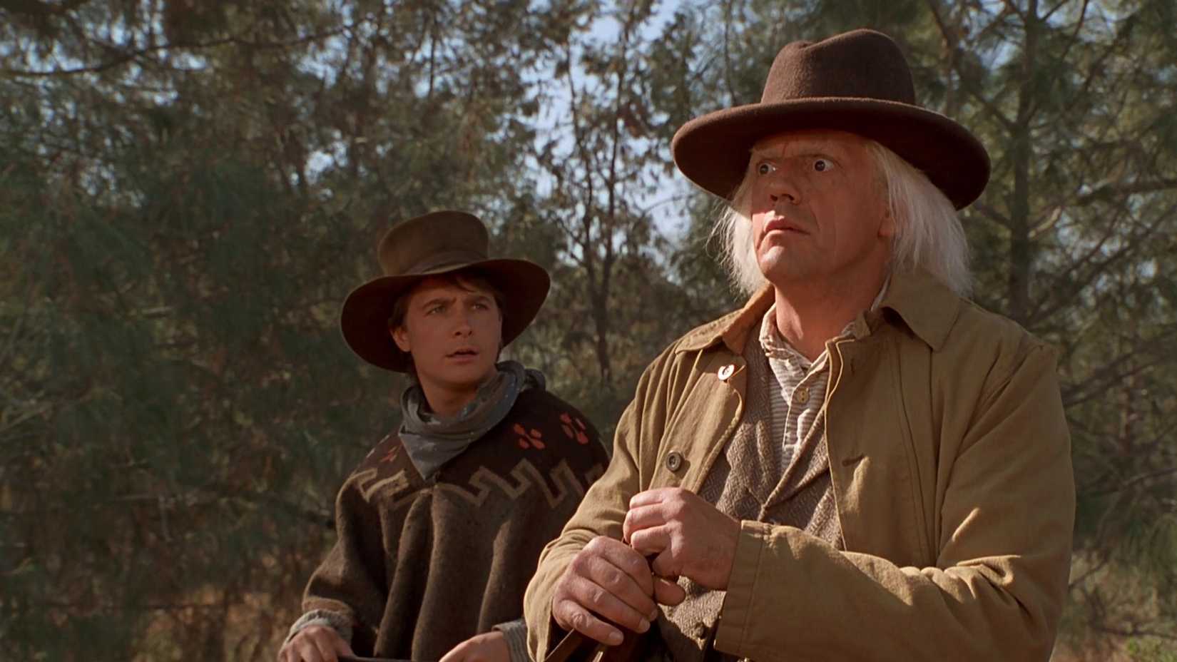 Christopher Lloyd nei panni di Doc Brown con Marty vestito da cowboy in Ritorno al futuro III