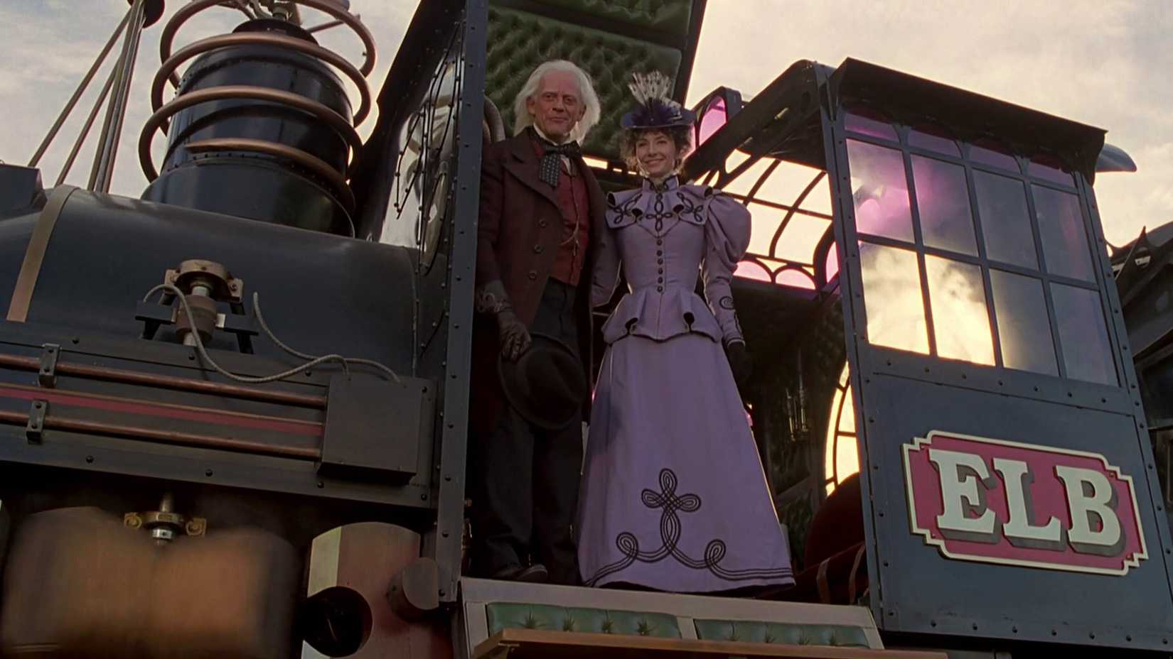 Christopher Lloyd as Doc Brown standing on a train in Back to the Future III
