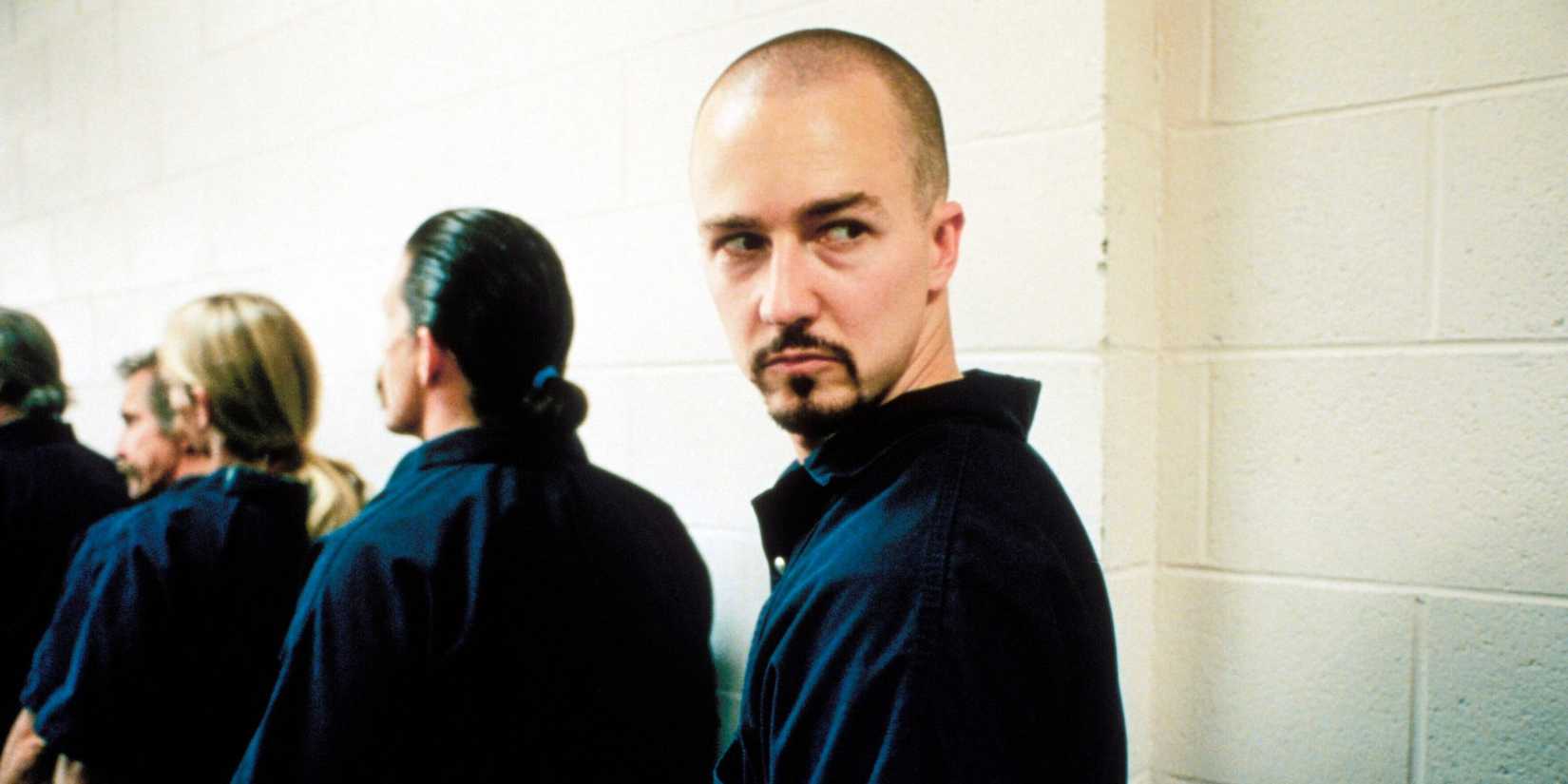 Derek with a shaved head in prison in American History X.