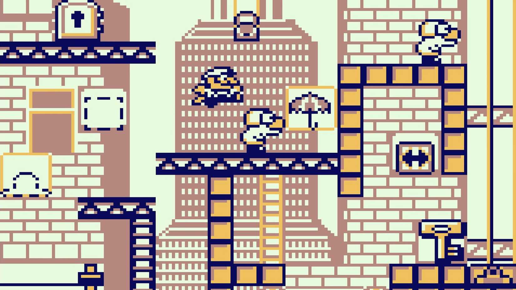 A Donkey Kong screenshot featuring Mario about to jump on an enemy.