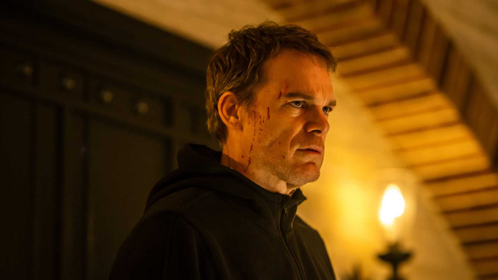 Michael C Hall with blood on his face from Dexter Resurrection