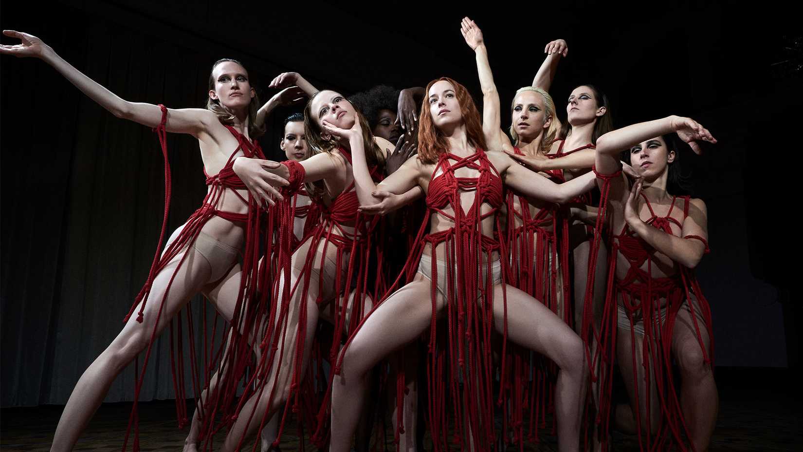 Dakota Johnson leads a group of dancers in 2018's Suspiria remake