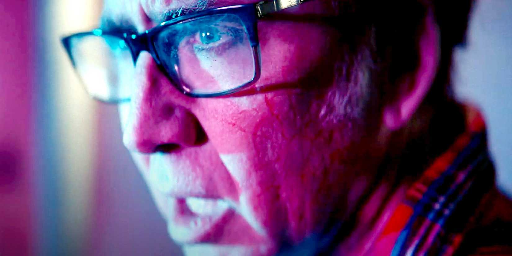 Nicolas Cage in pink light in Color Out of Space