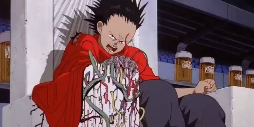 Tetsuo glares and sits on a throne in Akira 