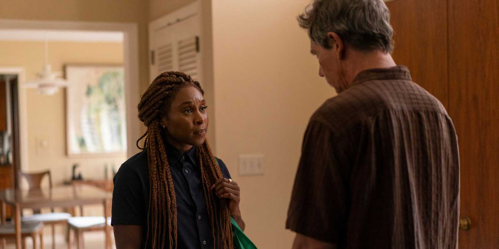 Holly looking at Ralph in The Outsider.