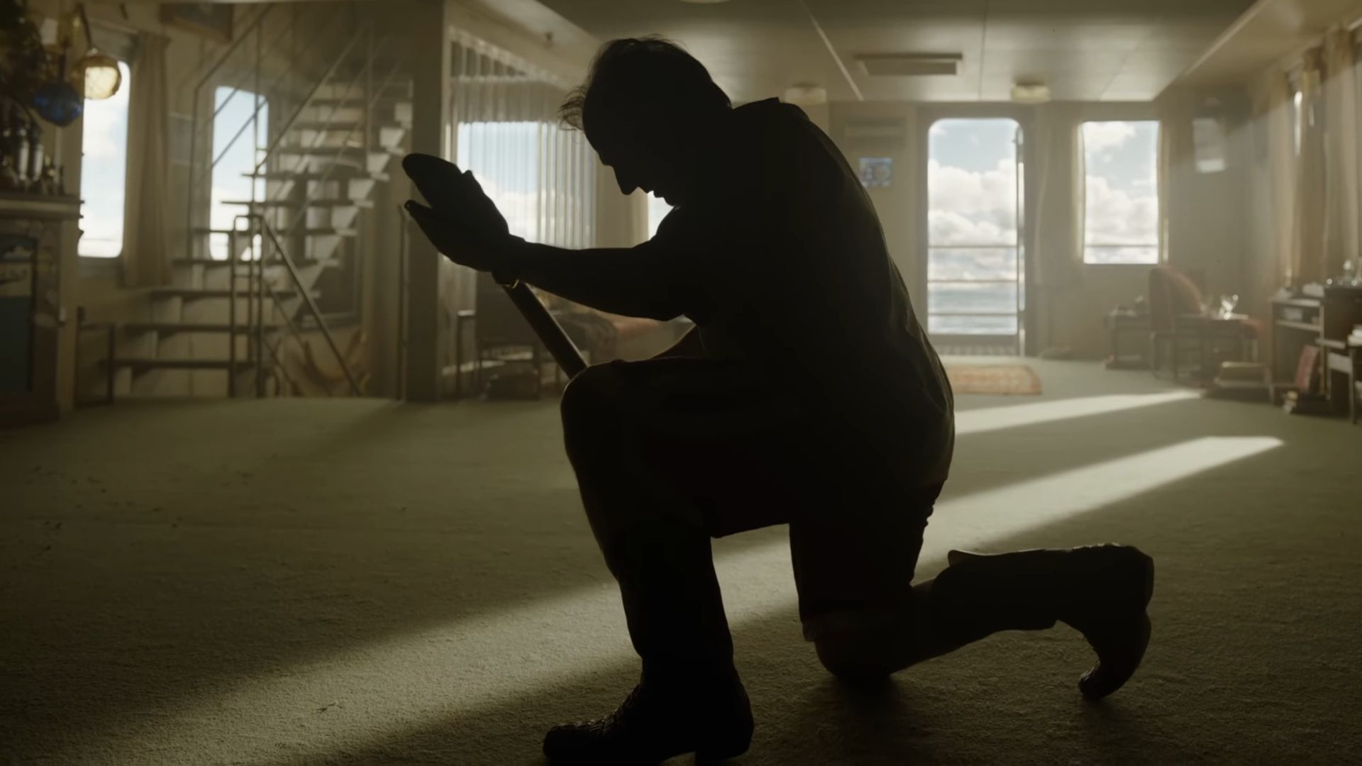 Tom Cruise as seen dancing with a shovel in a promo for 2026's Digger