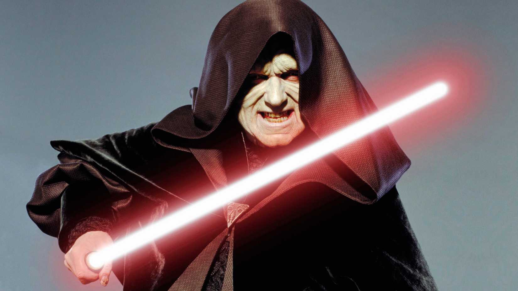 A promotional still of Palpatine with his lightsaber from Star Wars: Episode III - Revenge of the Sith