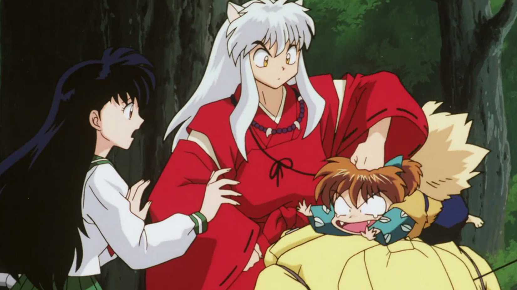 Inuyasha pounding Shippo while Kagome looks on in Panic