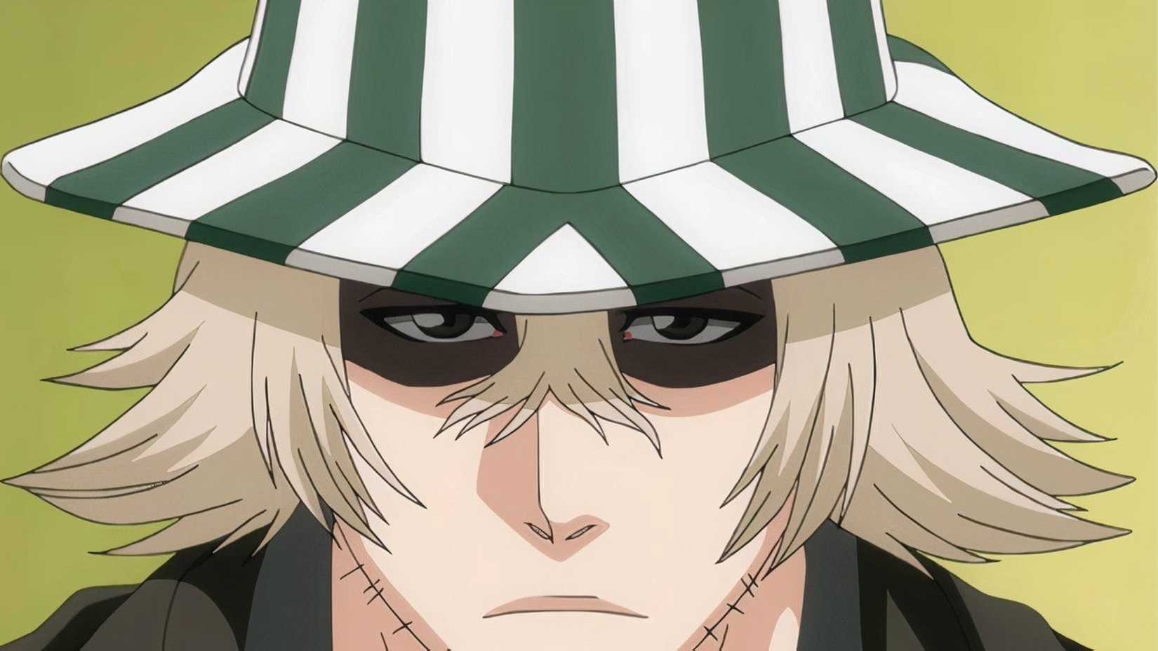 Kisuke Urahara from the Bleach series with a stern look on his face anime
