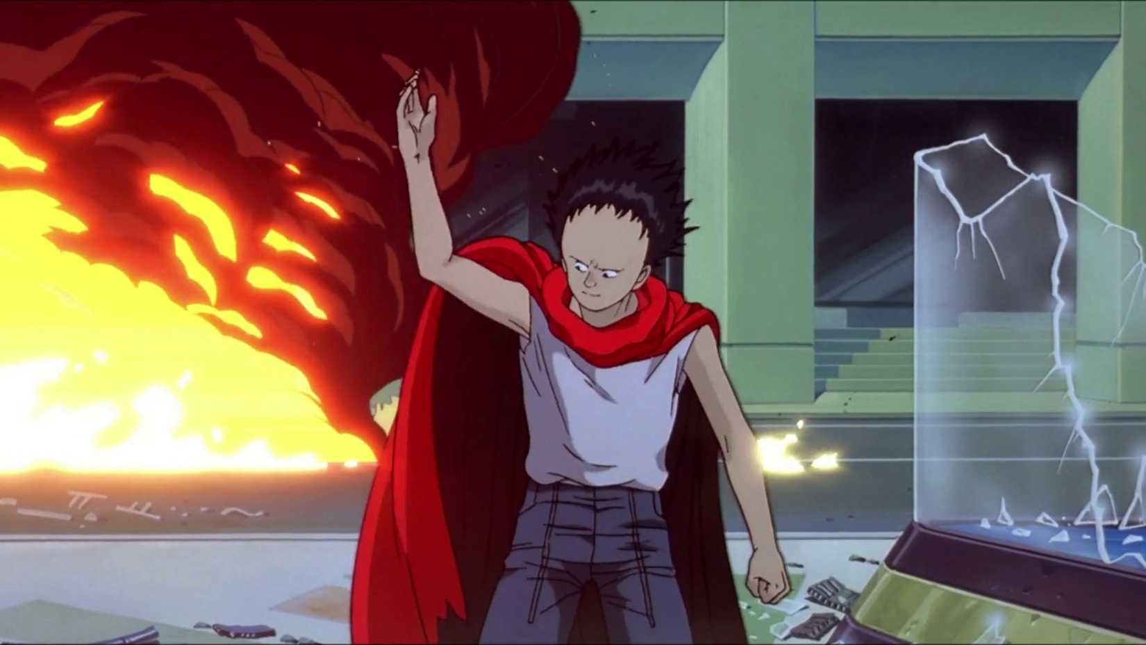 Tetsuo Shima holds his arm to trigger psychic destruction in Akira.