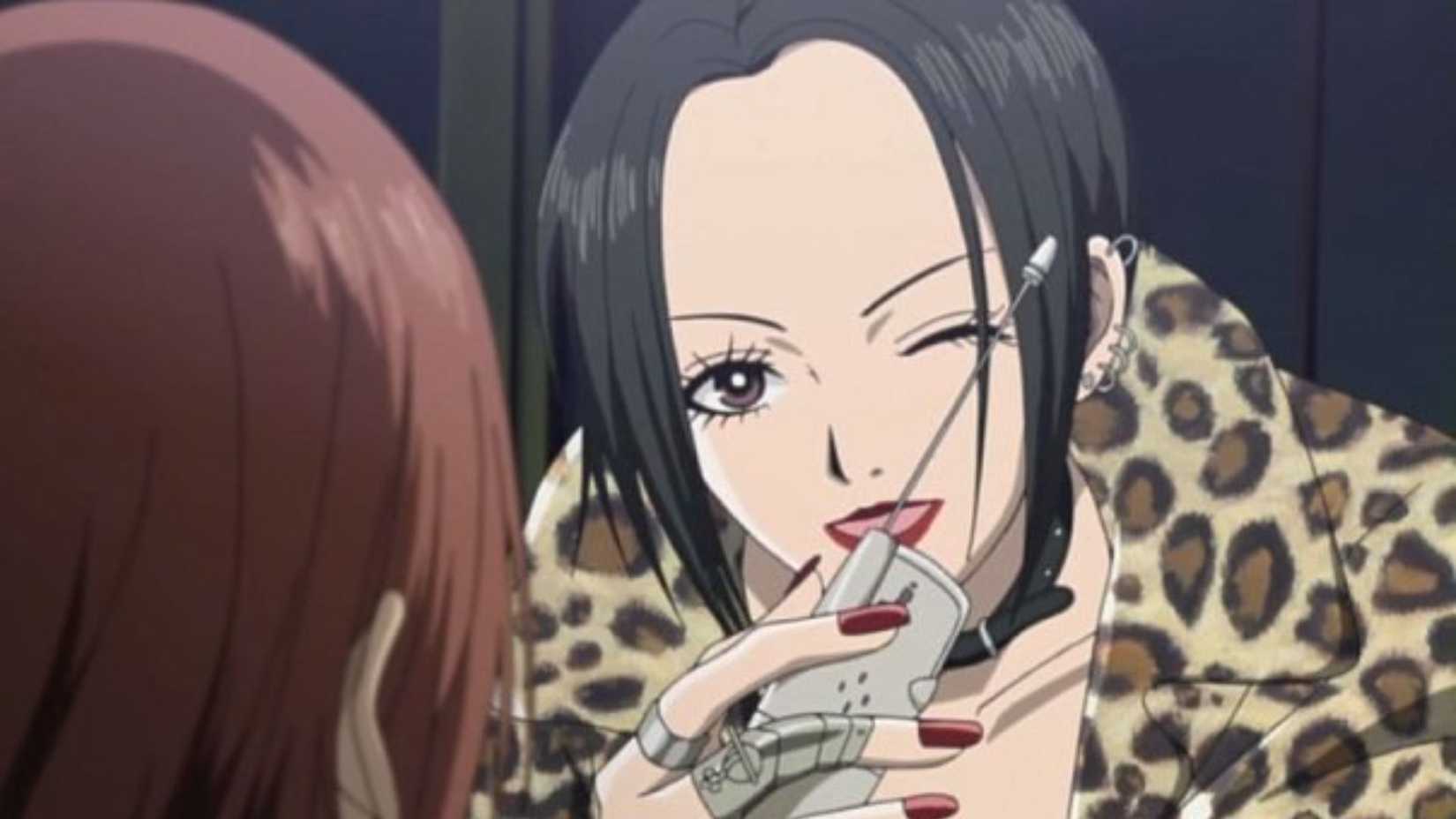 Nana Osaki sings to Nana Komatsu while wearing a leopard print coat.
