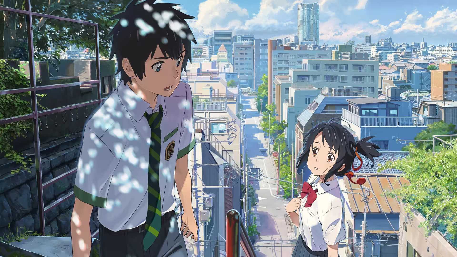 Taki and Mitsuha meeting on a staircase in Your Name.