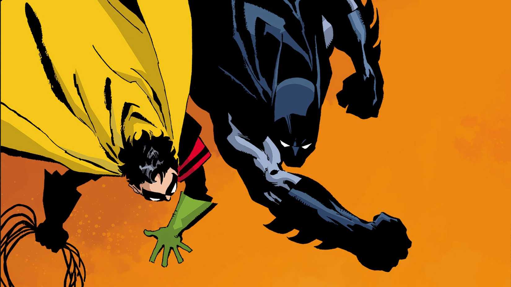 Batman and Robin spring to action on the cover of Dark Victory