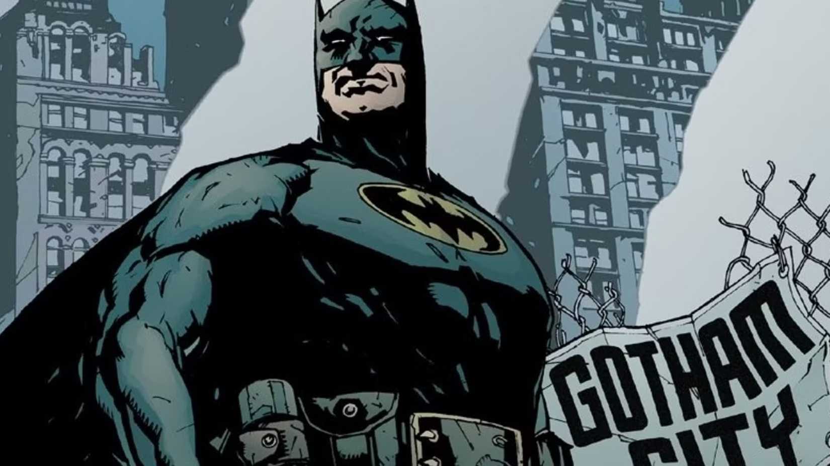 Batman stands in front of a crumbling Gotham in No Man's Land