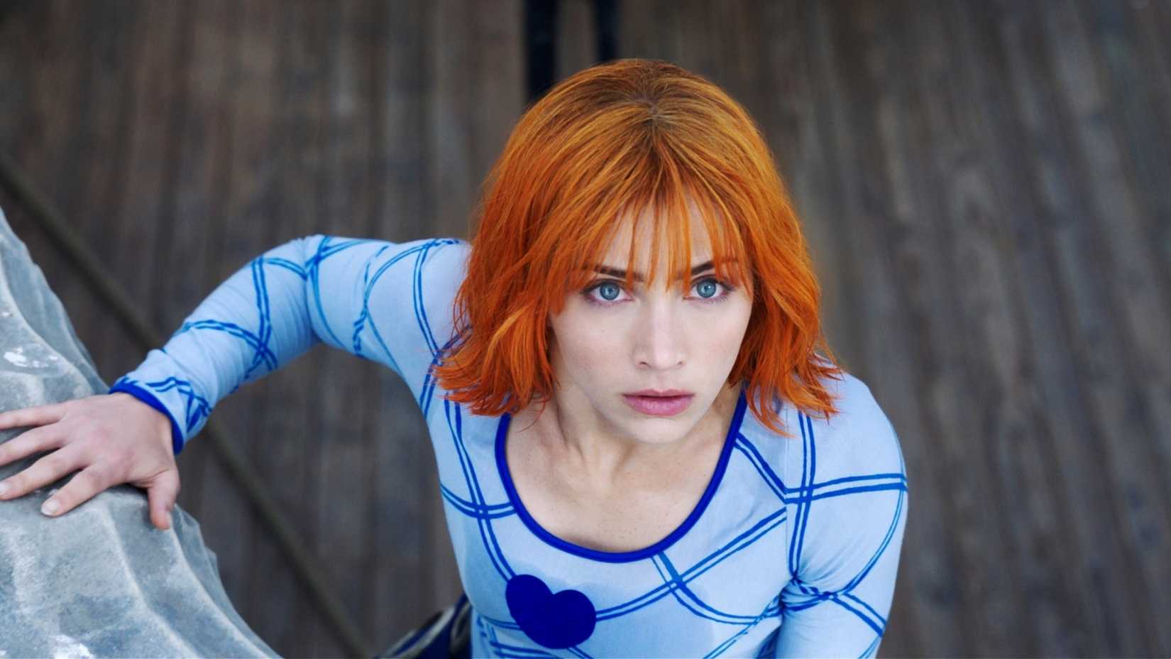 Emily Rudd as Nami in One Piece