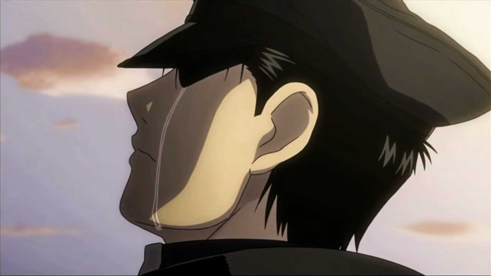 Roy Mustang pleure aux funérailles de Maes Hughes dans l'anime Fullmetal Alchemist: Brotherhood
