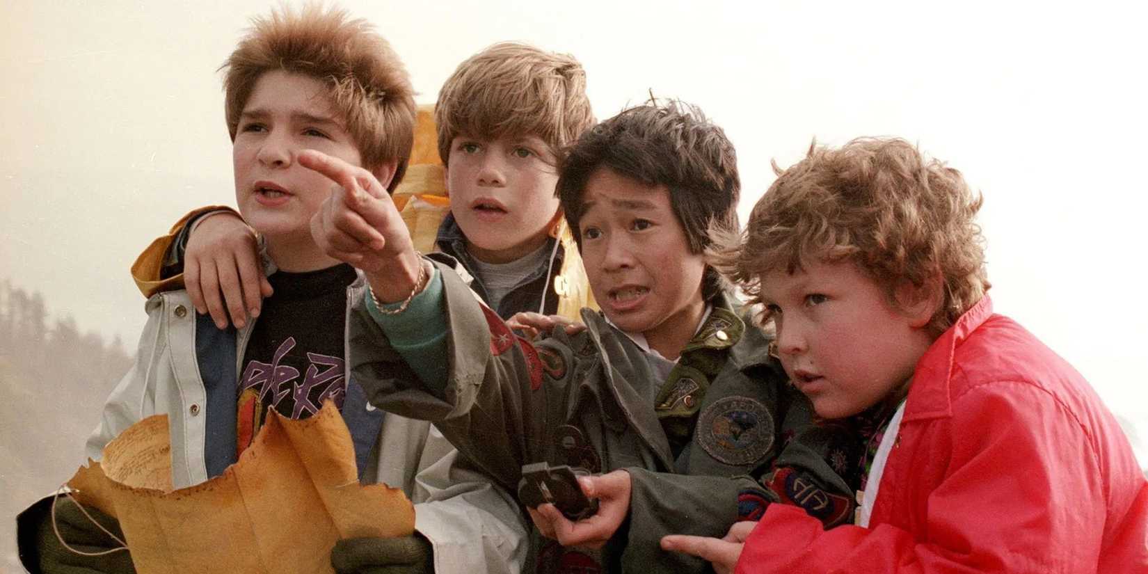 The Goonies kids looking at a map in The Goonies