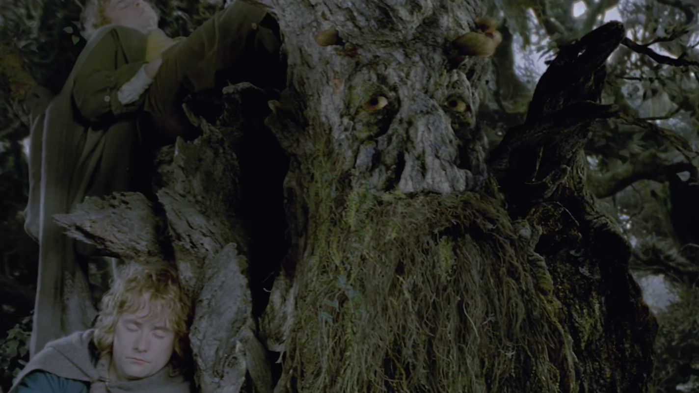 Merry and Pippin sleeping on Treebeard's shoulder in The Lord of the Rings: The Two Towers