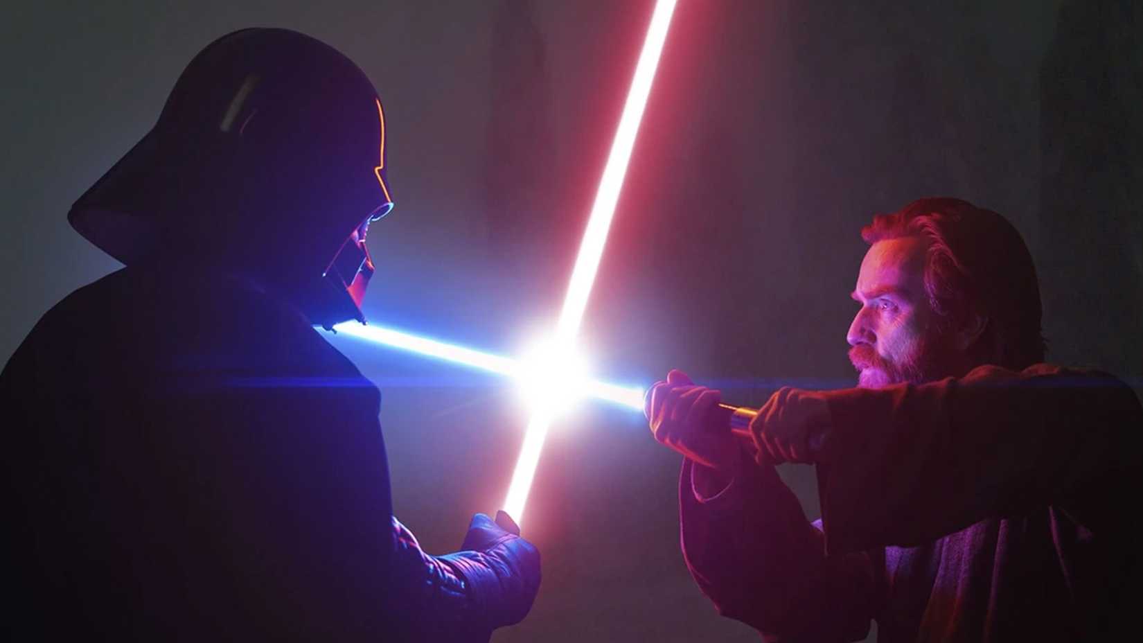 Obi Wan and Vader battle it out with lightsabers.
