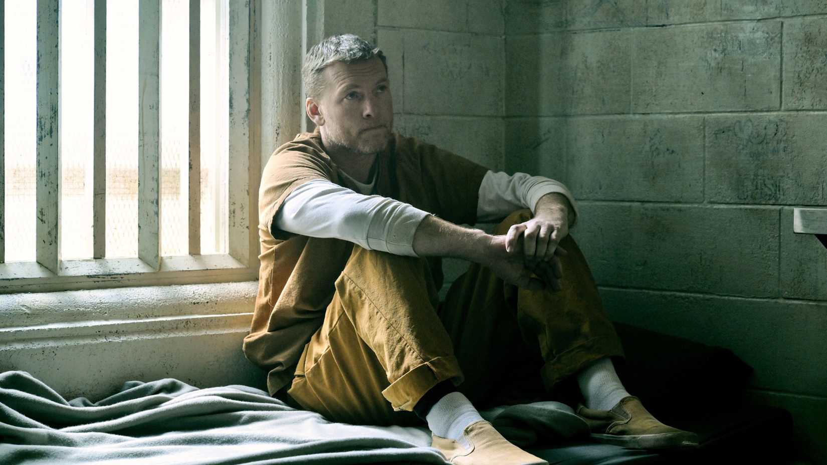 Sam Worthington in jail from Netflix's I Will Find You