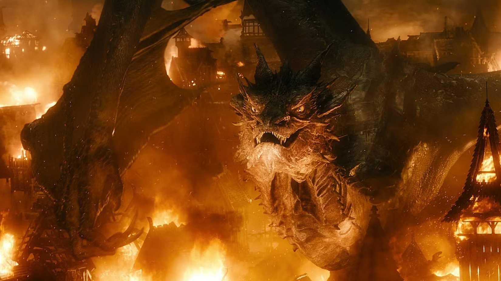 Smaug prowls through fire in The Hobbit.