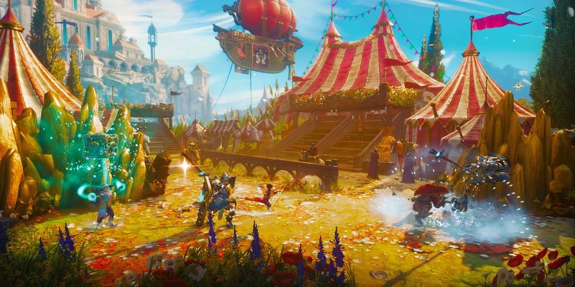 A carnival tent with a blimp in the background