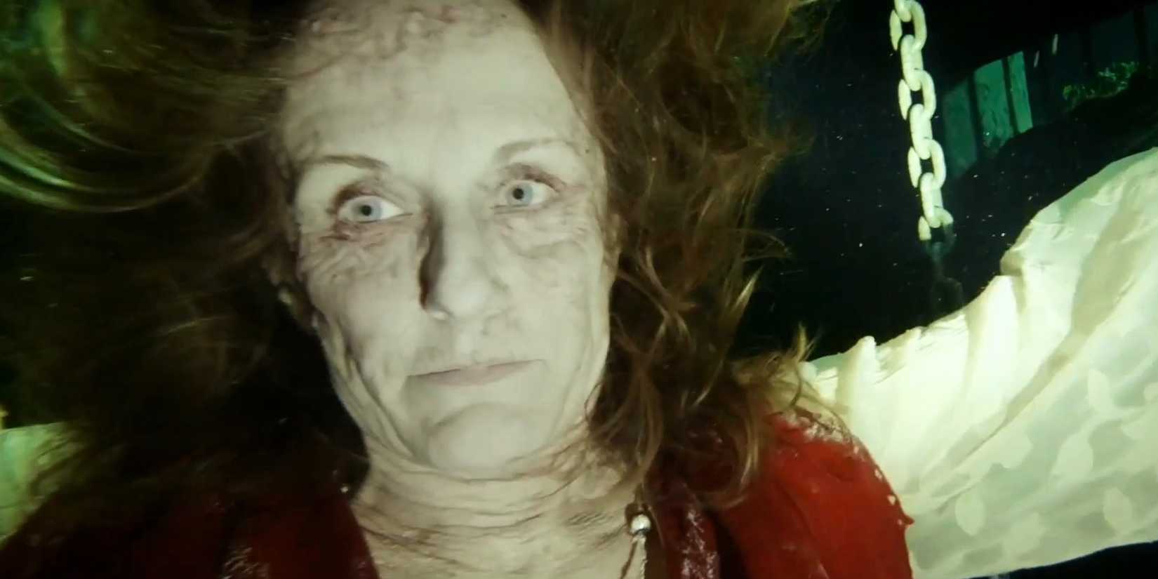 Woman bloated underwater in The Deep House
