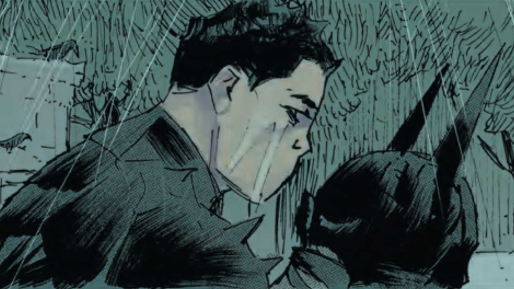 Bruce Wayne holding his cowl in the rain in Absolute Batman #22