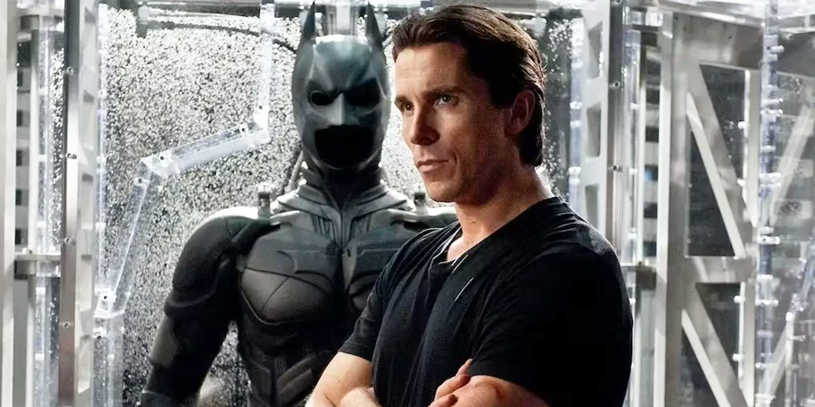Christian Bale as Bruce Wayne with the Batman suit in The Dark Knight