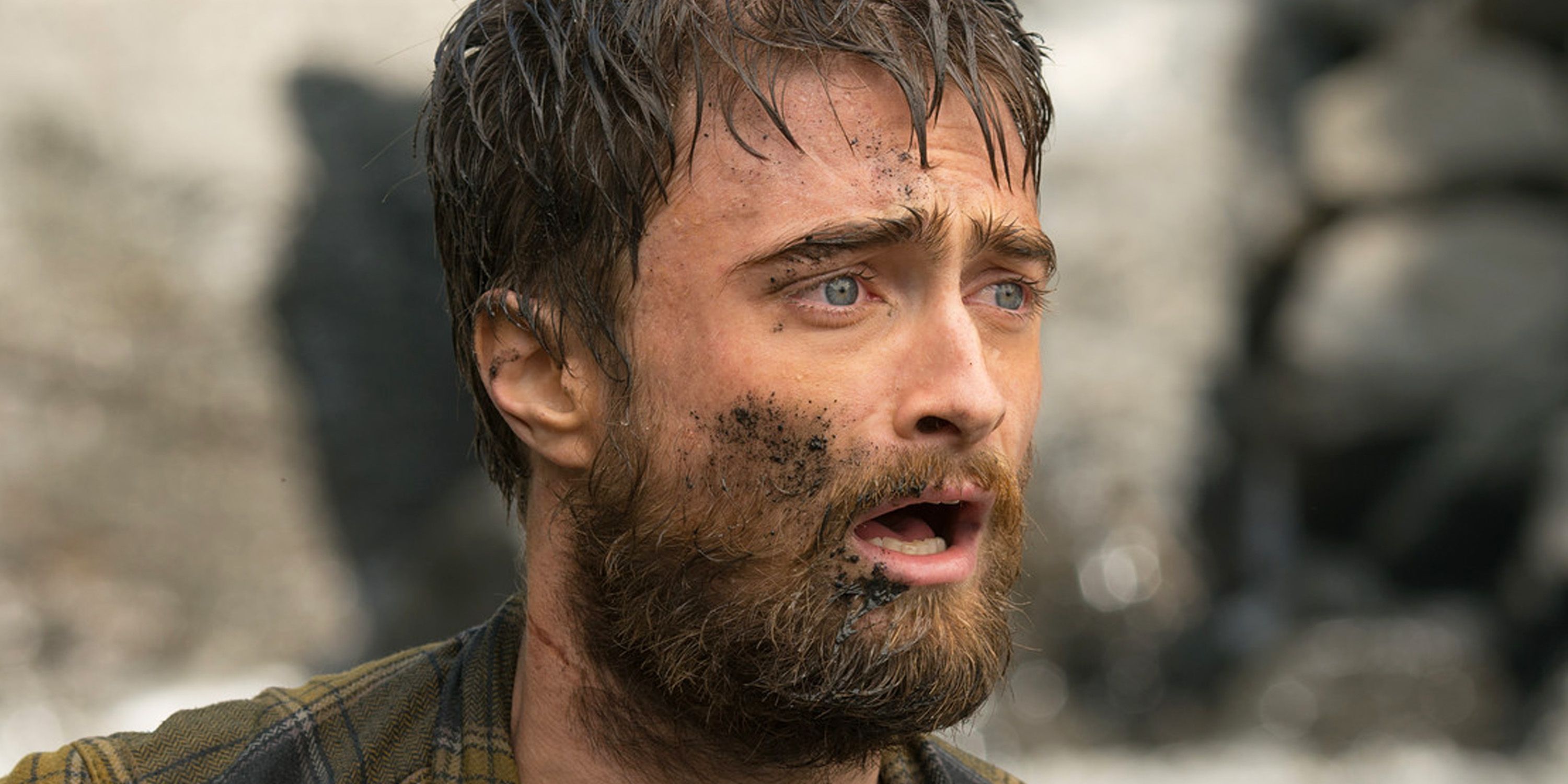 Daniel Radcliffe covered in dirt in Jungle