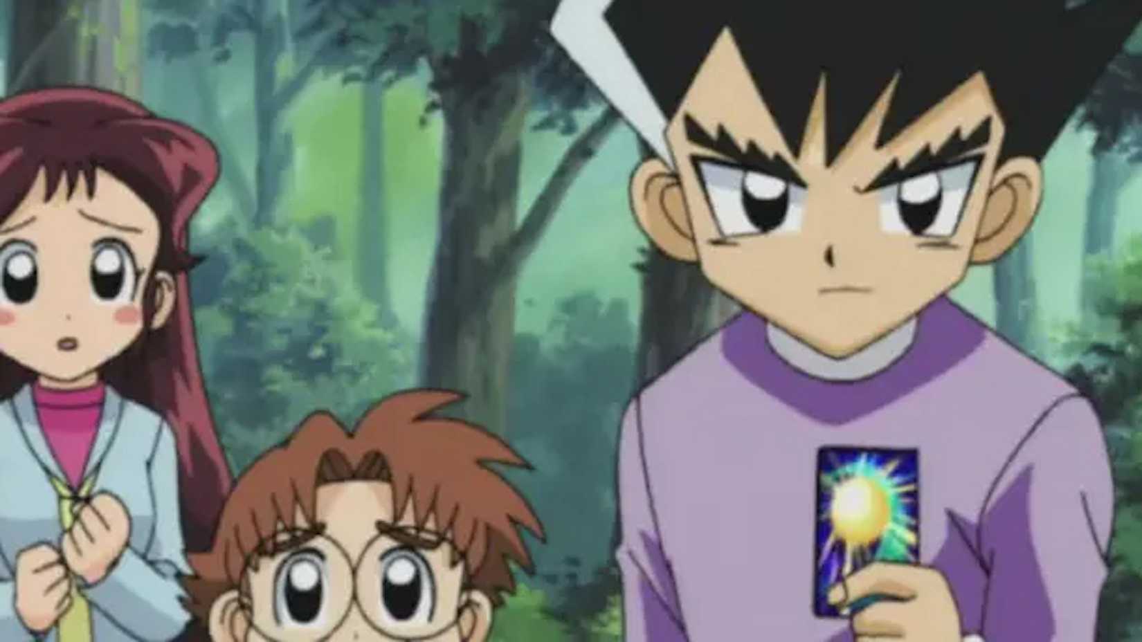 Shobu prepares to play a card in Duel Masters.