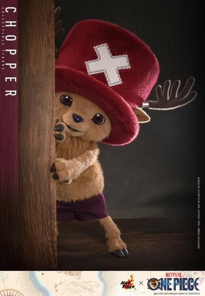 Standing 48.5 cm (19”) tall, the Tony Tony Chopper Collectible Figure has a specialized soft and squishy body covered in brown plush fabric, faithfully capturing his appearance on the live-action One Piece series on Netflix.