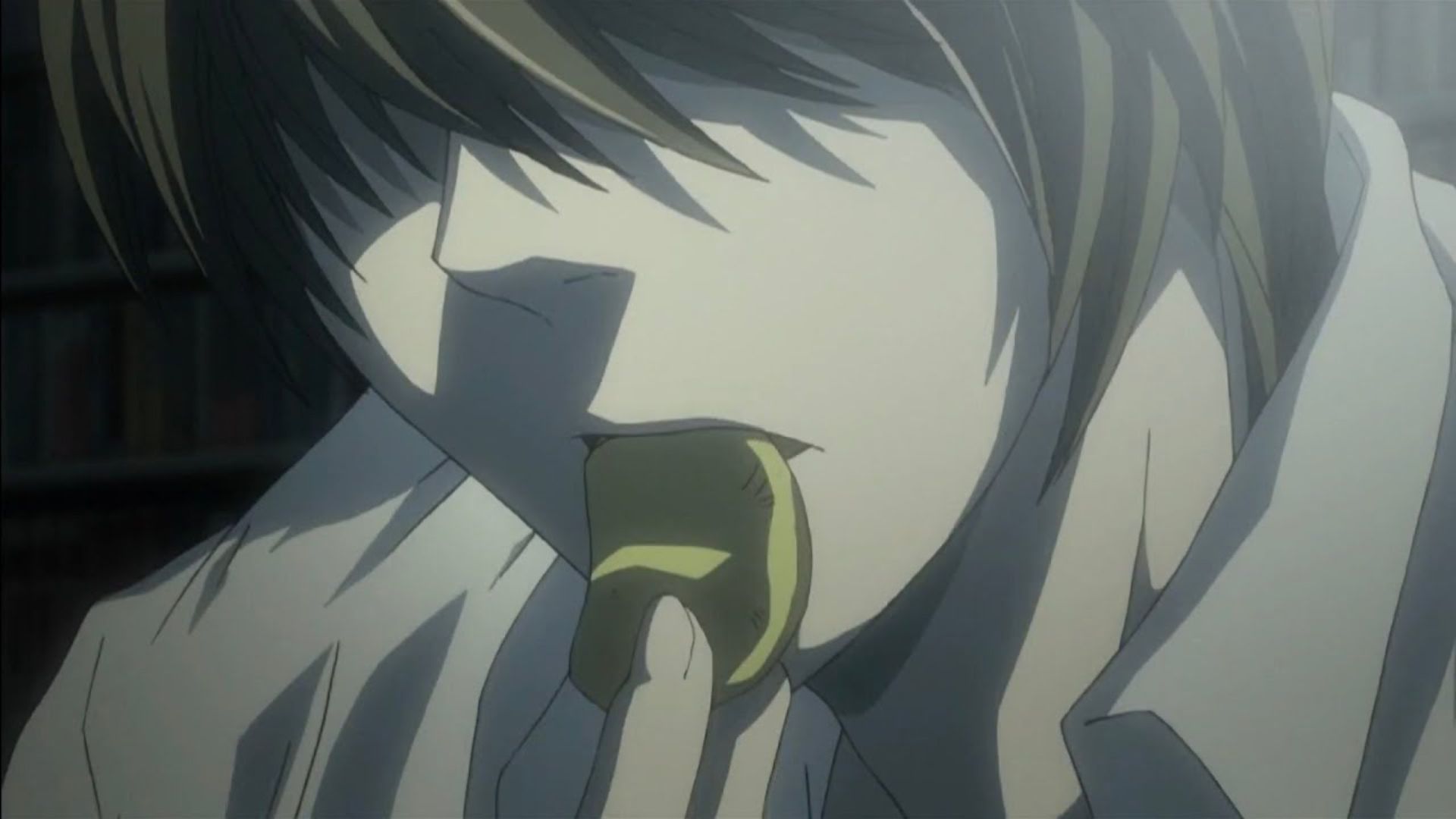 Light Yagami eating a potato chip in Death Note.