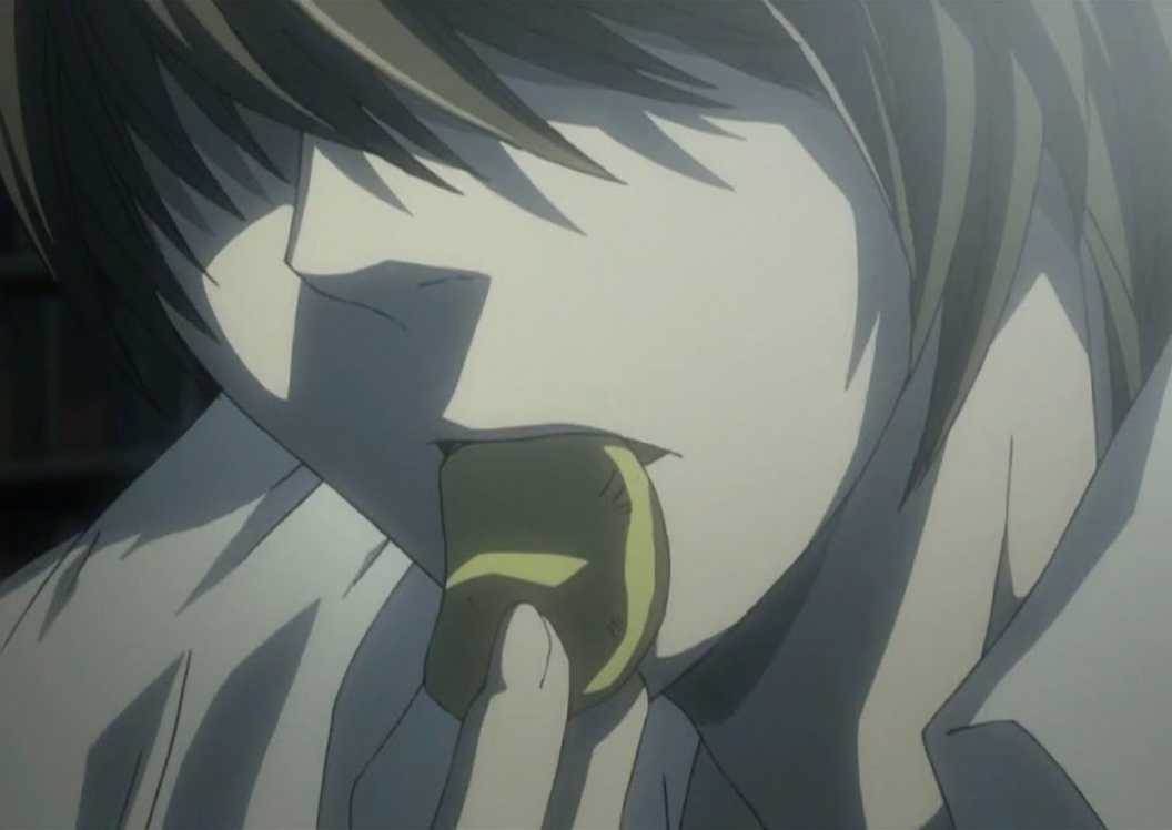 Light Yagami eating a potato chip in Death Note.