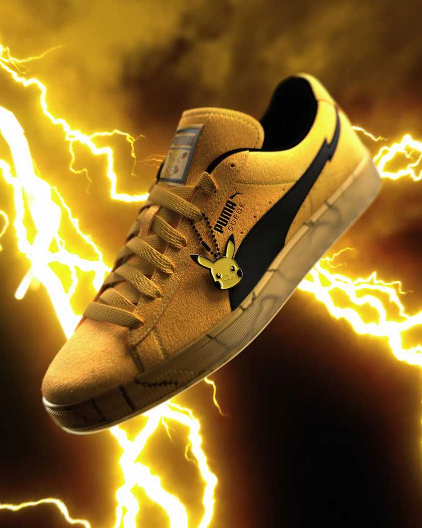 Limitowane sneakersy Puma Suede w żółto-czarnej kolorystyce Pikachu z motywem błyskawic i metalową zawieszką przedstawiającą popularnego Pokémona.
