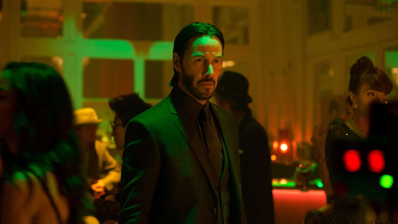 Keanu Reeves wearing suit in a still from John Wick