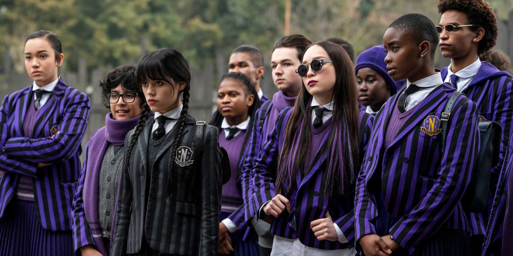 Wednesday Addams (Jenna Ortega) and her classmates in their Nevermore uniforms in Wednesday Season 1.