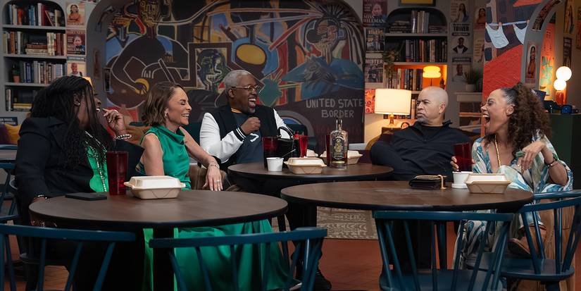 The parents from A Different World hanging out in the restaurant.