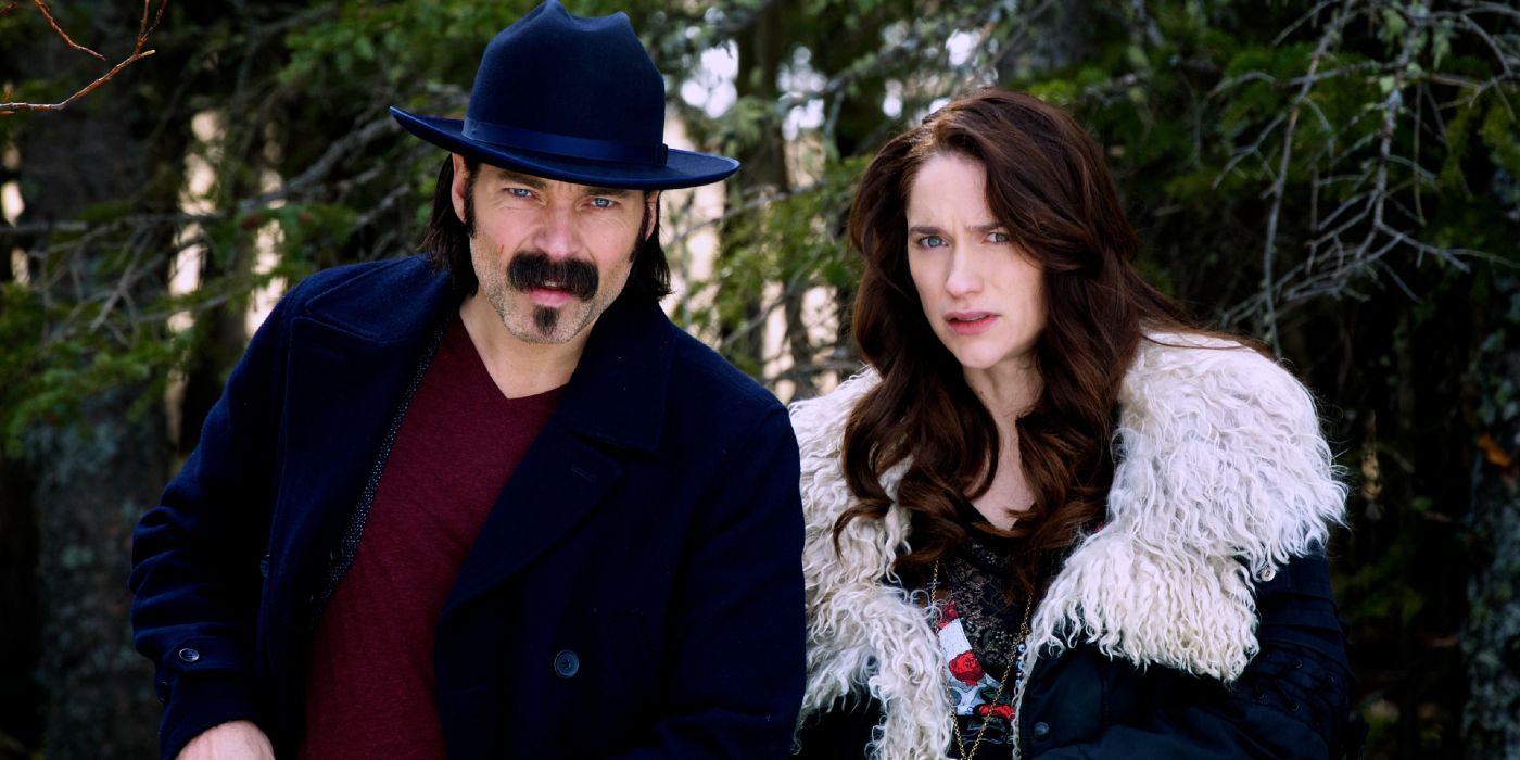 Doc Holliday and Wynonna Earp spot something in the snowy woods in Wynonna Earp