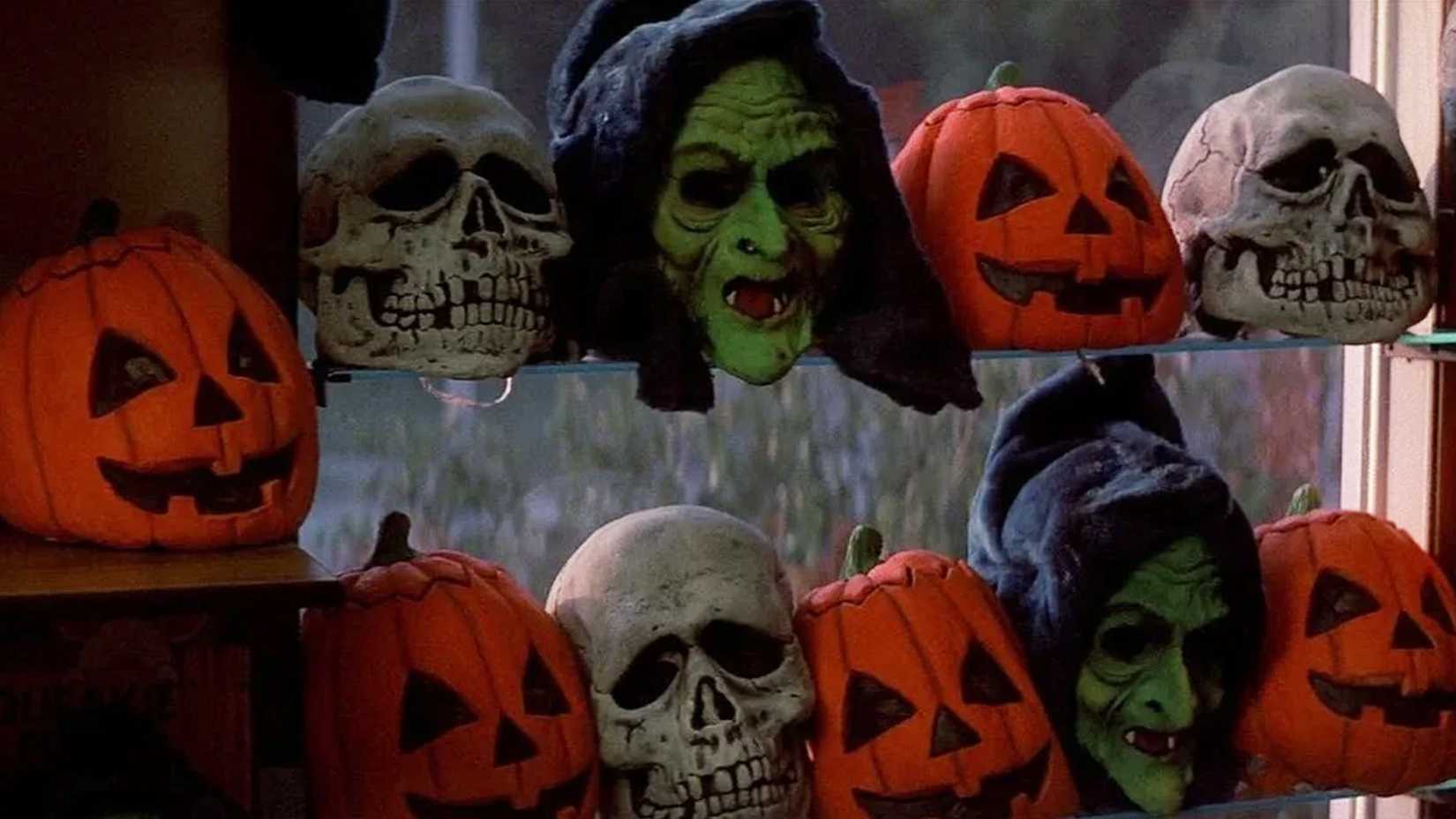 The Silver Shamrock Halloween masks lined up on shelves from Halloween III 