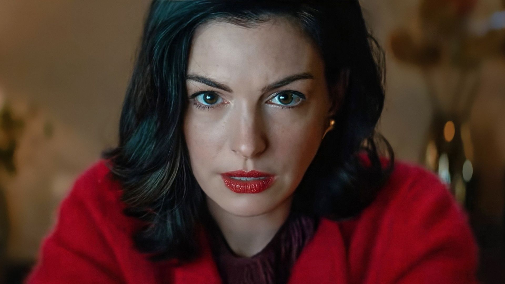 Anne Hathaway staring at the camera in Verity