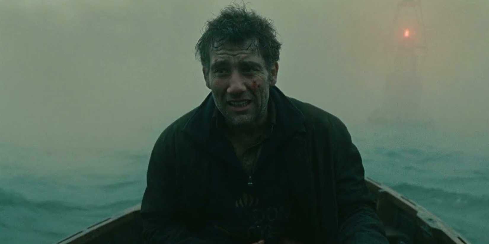 Clive Owen as Theo dying in the boat in Children of Men