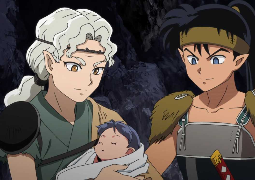 Koga and his wife looking at Kagome and Inuyasha's daughter