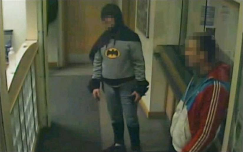 'Batman' turns suspect over to police, disappears into the night