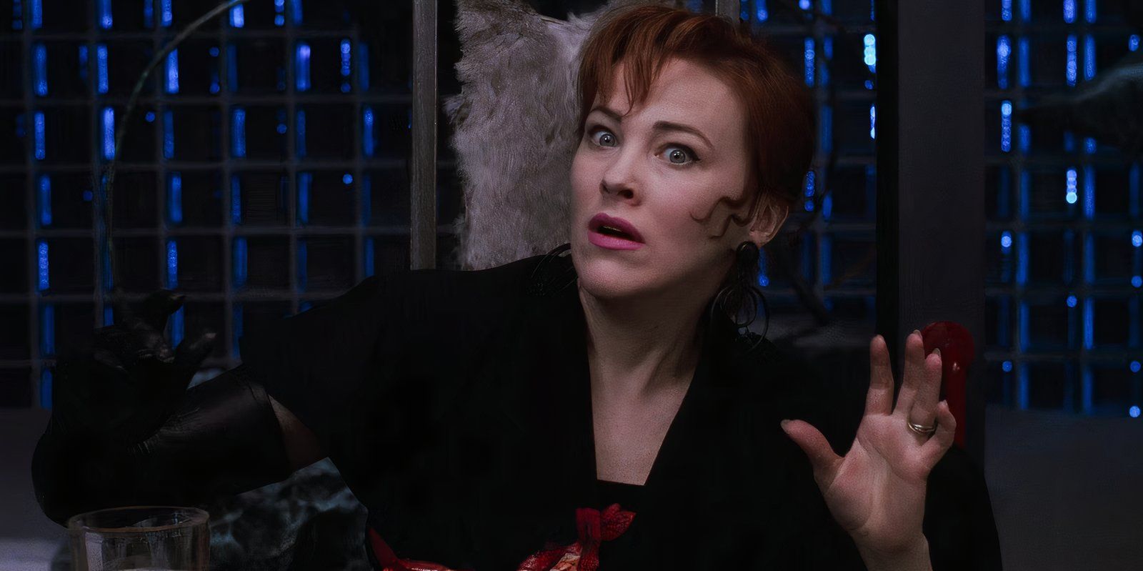 delia-deetz-looks-shocked-with-her-hand-in-the-air-during-the-day-o-scene-in-beetlejuice.jpg